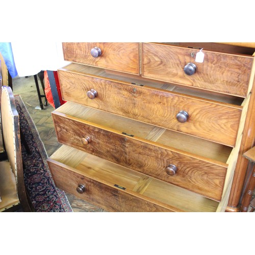 872 - A Victorian mahogany chest of drawers, the rectangular top with rounded front corners, above a cushi... 