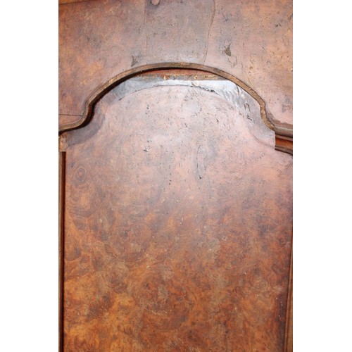 869 - A Victorian burr walnut breakfront triple wardrobe, the stepped cavetto cornice above a central mirr... 