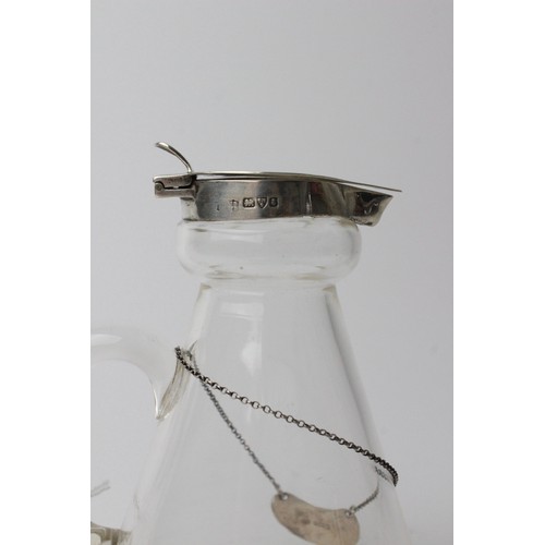 75 - An Edwardian silver mounted glass whiskey noggin by James Deakin & Sons, Chester 1905, of typical ha... 