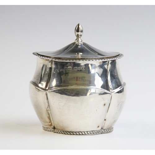 117 - An Edwardian silver tea caddy by George Unite & Sons, Chester 1901, of oval quatrefoil form with ree... 