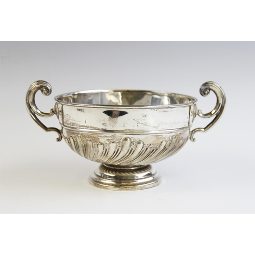 119 - An Edwardian silver twin handled bowl by Barker Brothers, Chester 1908, of circular form with half f... 