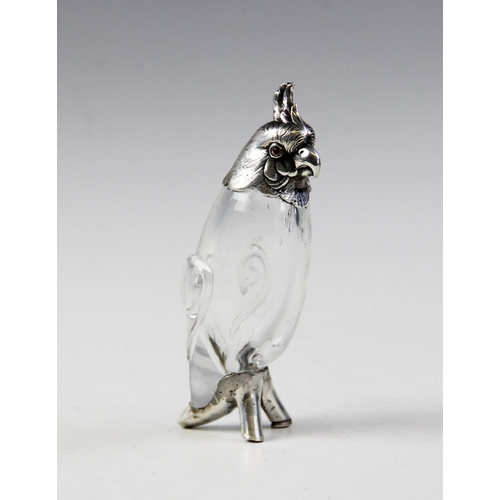 130 - A Victorian silver and glass pepperette modelled as a cockatoo by Henry William Curry, London 1883, ... 