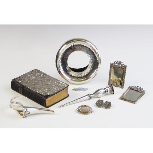 132 - A selection of silver ladies accessories, to include a silver posy holder, dated London 1955, of cor... 