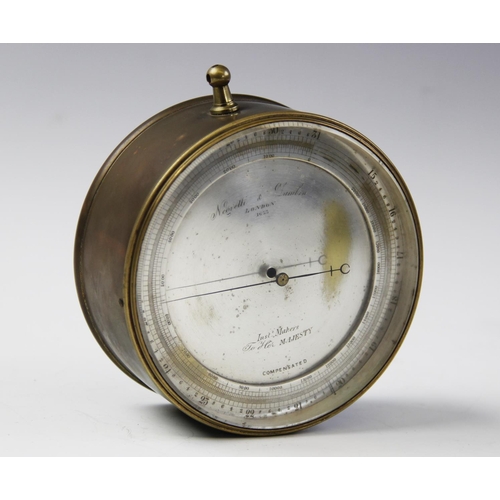 637 - A brass cased altimeter by Negretti & Zambra of London, the altimeter with silvered dial inscribed '... 