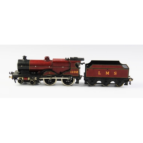 643 - An O Gauge clockwork 4-4-0 locomotive and tender, probably by Bassett-Lowke, in maroon L.M.S. livery... 