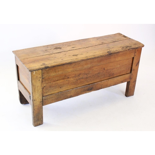 681 - An 18th century and later elm coffer, with a rectangular removable cover above plain panelled sides,... 