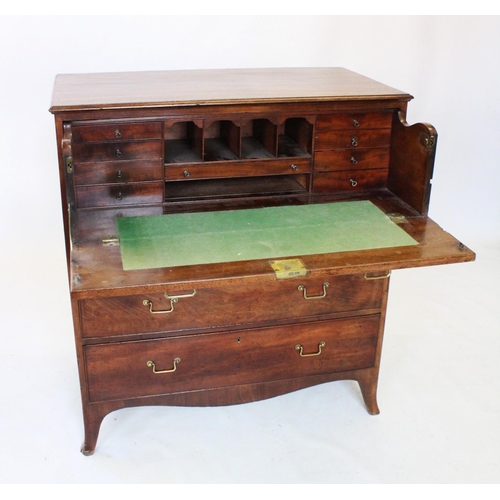 703 - A George III mahogany secretaire chest of drawers, the rectangular top above a fall front secretaire... 