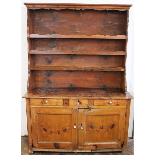 740 - A 19th century pine kitchen dresser, the associated high back with three shelves upon a base with th... 