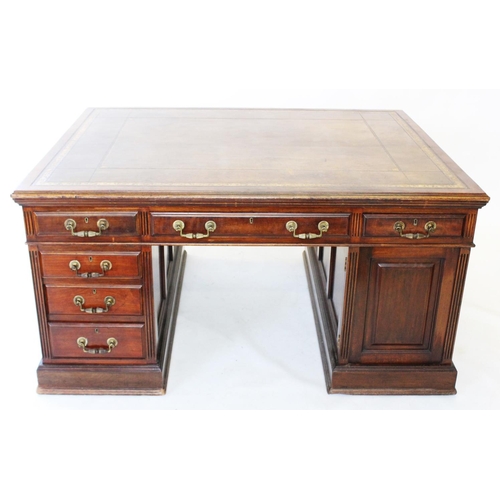 765 - A late Victorian mahogany partners desk, the rectangular moulded top inset with a gilt tooled tan le... 