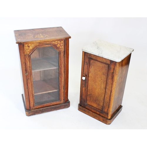 766 - A Victorian figured walnut pot cupboard, the white marble slab top above a single panelled door appl... 