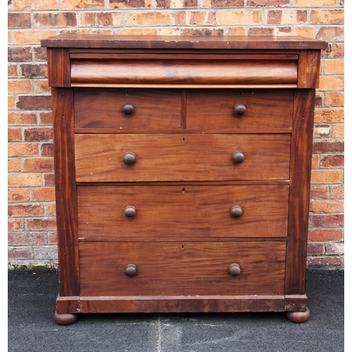 774 - A Victorian mahogany chest of drawers, with a cushion frieze drawer, above an arrangement of two sho... 