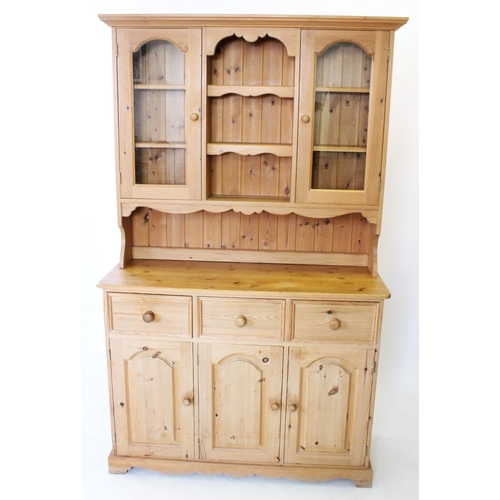 785 - A Victorian style pine kitchen dresser, late 20th century, the high back with a pair of glazed doors... 