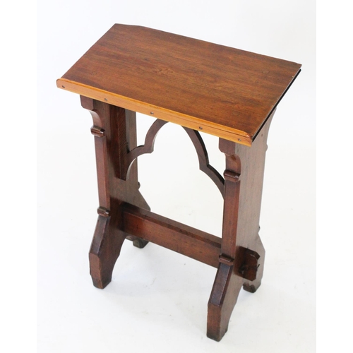 789 - A Victorian pitch pine lectern, the rectangular sloping book rest raised upon 'V' cut trestle type s... 