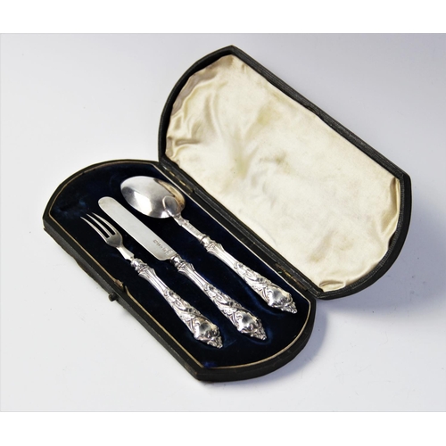 79 - A Victorian silver christening set comprising a spoon, fork and knife by George Unite & Sons, 1869, ... 