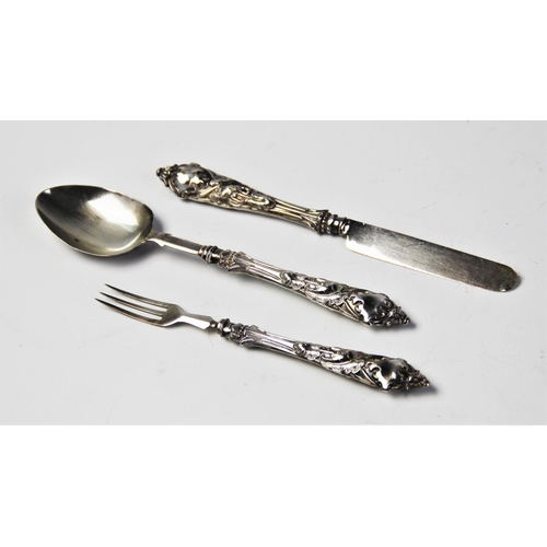 79 - A Victorian silver christening set comprising a spoon, fork and knife by George Unite & Sons, 1869, ... 