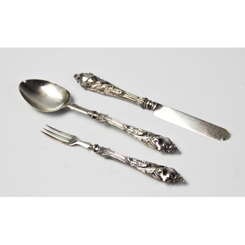 79 - A Victorian silver christening set comprising a spoon, fork and knife by George Unite & Sons, 1869, ... 