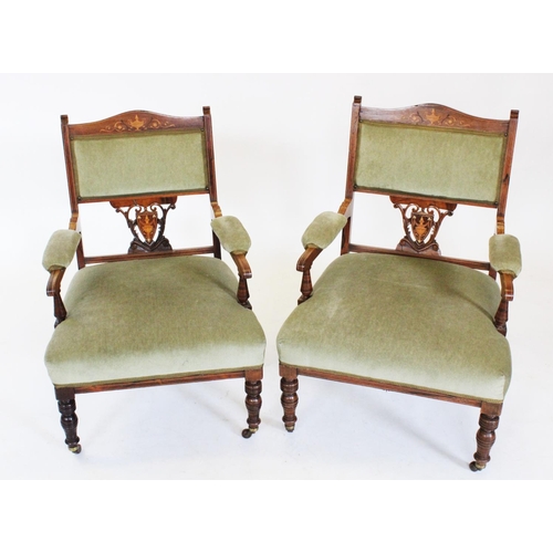 809 - A pair of Edwardian rosewood parlour chairs, each with a padded back rest above an inlaid and open w... 