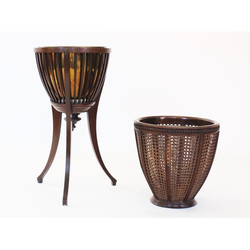 812 - A Regency style mahogany jardinere stand, 20th century, of slatted tapering form with brass domed li... 