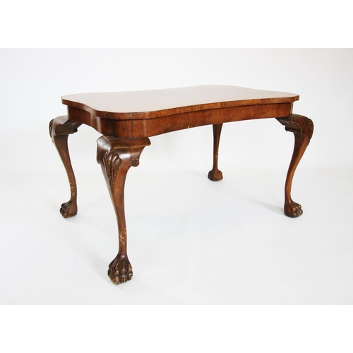 693 - A George II style burr walnut occasional table, circa 1930, the quarter veneered waisted rectangular... 