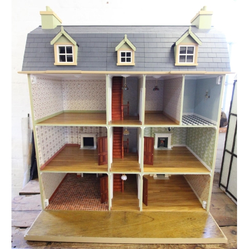 649 - A late 20th century hand made custom built dolls house, circa 1981, the twelve room house of Georgia... 