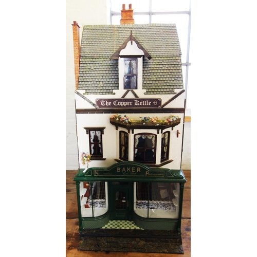 650 - A late 20th century hand made custom built dolls house, circa 1980's, the house modelled as a Victor... 