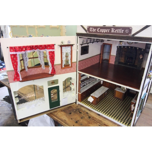 650 - A late 20th century hand made custom built dolls house, circa 1980's, the house modelled as a Victor... 