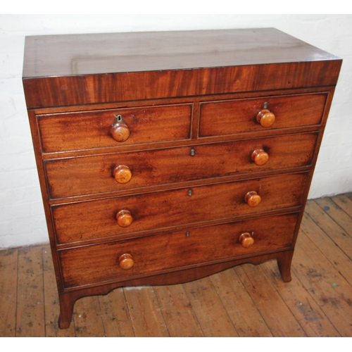 702 - An early 19th century straight front mahogany chest of drawers, the rectangular top inlaid with ebon... 