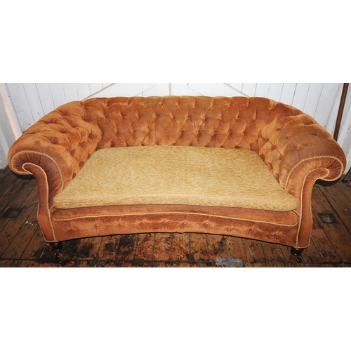 787 - A Victorian Chesterfield type settee, later re-covered with golden brown fabric and rope edging, the... 