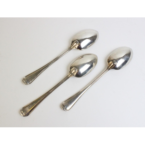 96 - Three silver serving spoons by Goldsmiths & Silversmiths Company, London 1923, each with initial 'D'... 