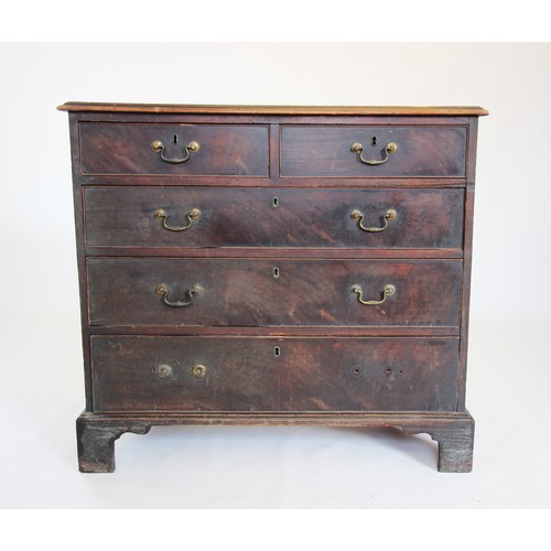 700 - A George III mahogany chest of drawers, the rectangular moulded top above two short and three long c... 