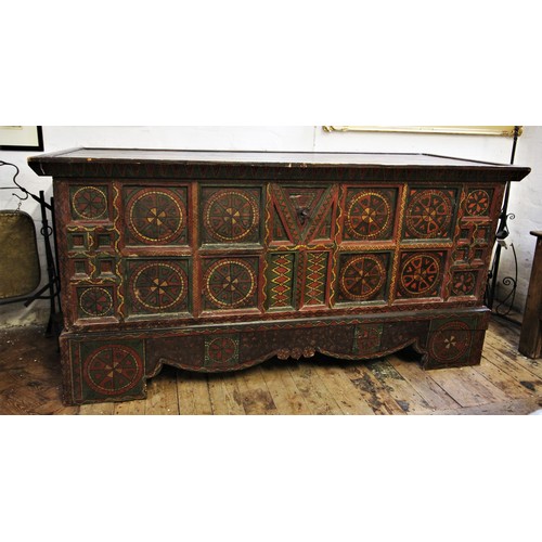 732 - A 19th century Eastern European painted folk art pine chest, painted with geometric designs, the hin... 