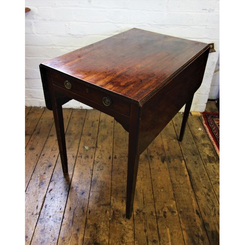 714 - An early 19th century mahogany Pembroke table, with a single frieze drawer opposed by a faux drawer,... 