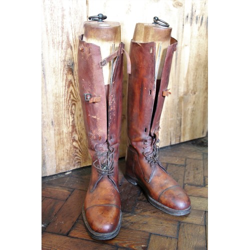 635 - A pair of early 20th century laced leather hunting boots, by Maxwell of London, with three buckle ga... 