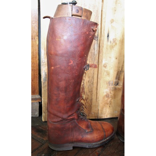 635 - A pair of early 20th century laced leather hunting boots, by Maxwell of London, with three buckle ga... 