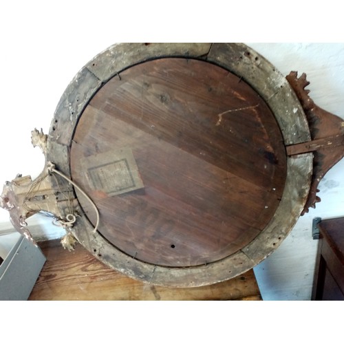 701 - A Regency gilt wood and gesso circular wall mirror, the eagle crest above a 36cm convex mirrored pla... 