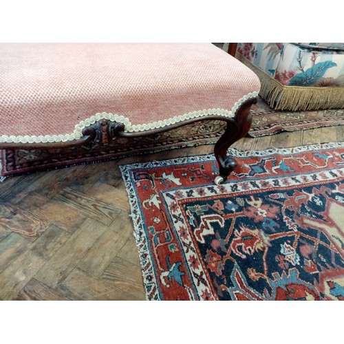 764 - A mid 19th century walnut and upholstered foot stool, the rectangular upholstered seat raised upon c... 