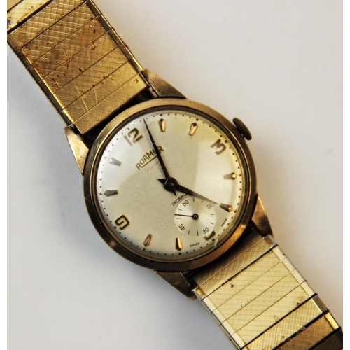 115 - A 9ct gold vintage Roamer Incabloc wristwatch, the round cream dial with baton and Arabic numeral ma... 