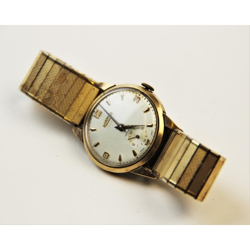 115 - A 9ct gold vintage Roamer Incabloc wristwatch, the round cream dial with baton and Arabic numeral ma... 