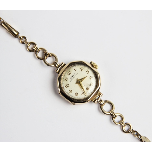 129 - A vintage 9ct gold Liga lady's wristwatch, the circular white dial with Arabic numerals and subsidia... 