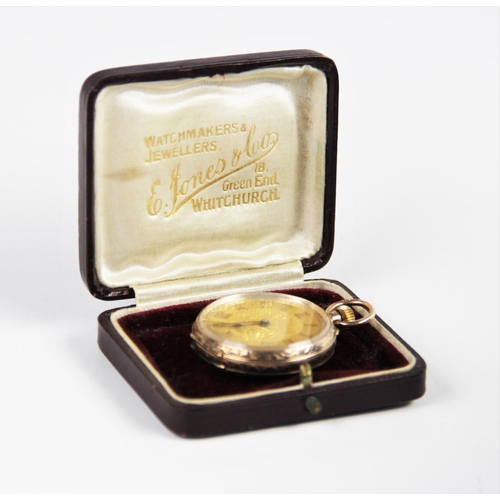 130 - An Edwardian 9ct gold lady's fob watch, London import marks for 1907, the gold toned dial with engra... 