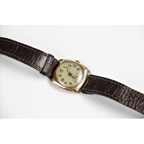 143 - A gent's vintage 9ct gold wristwatch, the circular dial with luminous Arabic numerals and infilled h... 