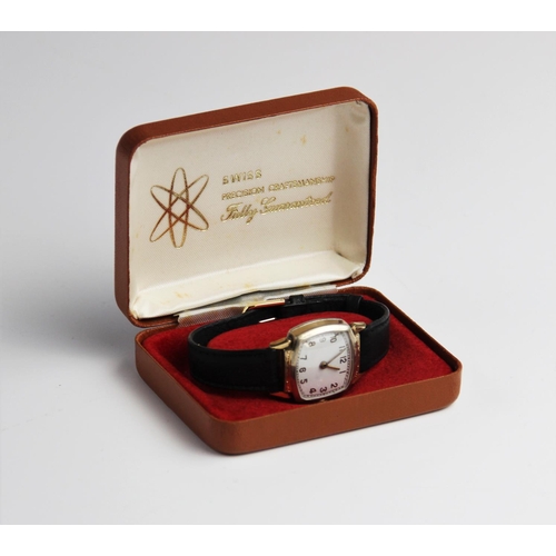 146 - A vintage wristwatch, the white enamel dial with gold toned Arabic numerals and outer seconds track,... 