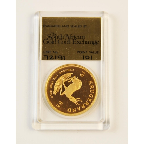 152 - A South Africa Krugerrand 1983, in a plastic display case with evaluation certificate from The South... 