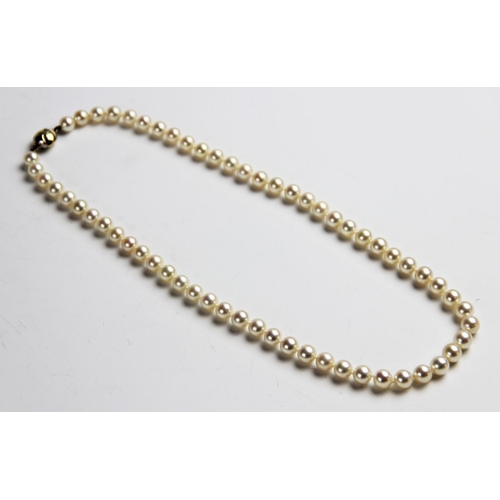 172 - A cultured pearl necklace with an 18ct gold clasp, comprising a single row of round cultured pearls,... 