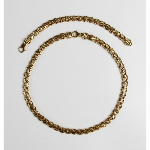 191 - An 18ct gold collarette and bracelet by UnoAErre, the woven link collarette with lobster claw fasten... 