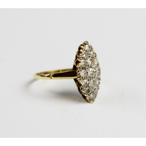 193 - A diamond and 18ct gold marquise cluster ring, comprising fifteen round brilliant cut diamonds, milg... 