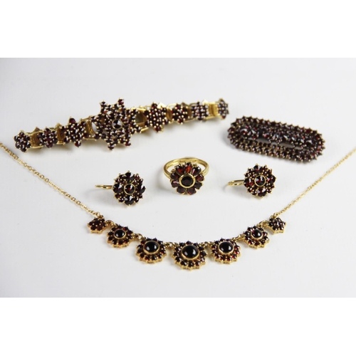 222 - A suite of Bohemian garnet set silver gilt jewellery, to include a pair of floral cluster drop earri... 