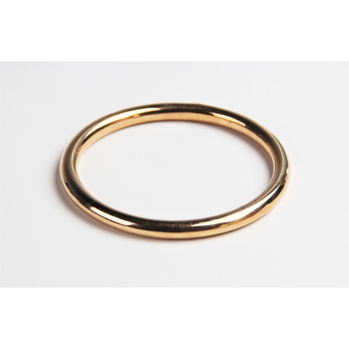 224 - A 9ct gold tubular slave bangle by S Ward & Sons, Chester 1920, 9cm diameter, weight 16.7gms