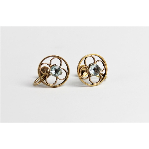 247 - A pair of zircon set 9ct gold earrings, each comprising a central round mixed cut light blue zircon ... 