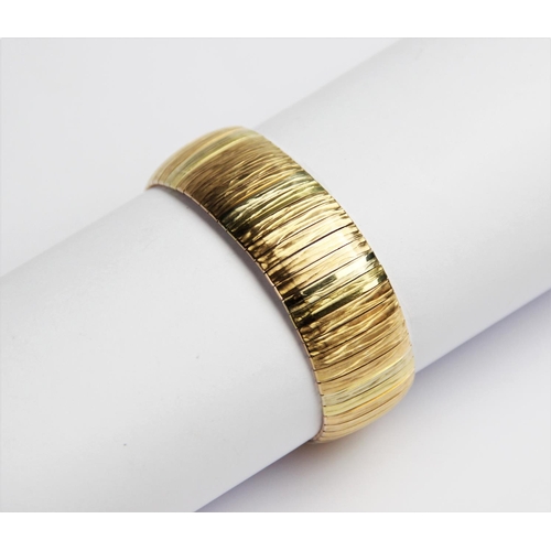 248 - An 18ct gold three colour bracelet, comprising alternating panels of yellow, white and rose gold wit... 